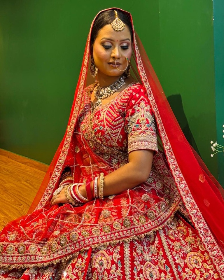 Bridal Red Lehenga Seated Full Pose